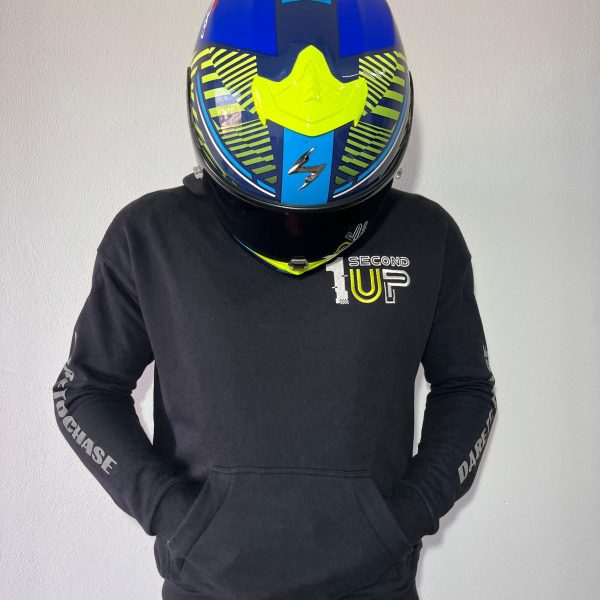 Second 1UP black motorcycle hoodie with 'Dare to Chase' branding, worn by a person in a helmet, designed for motorsports enthusiasts