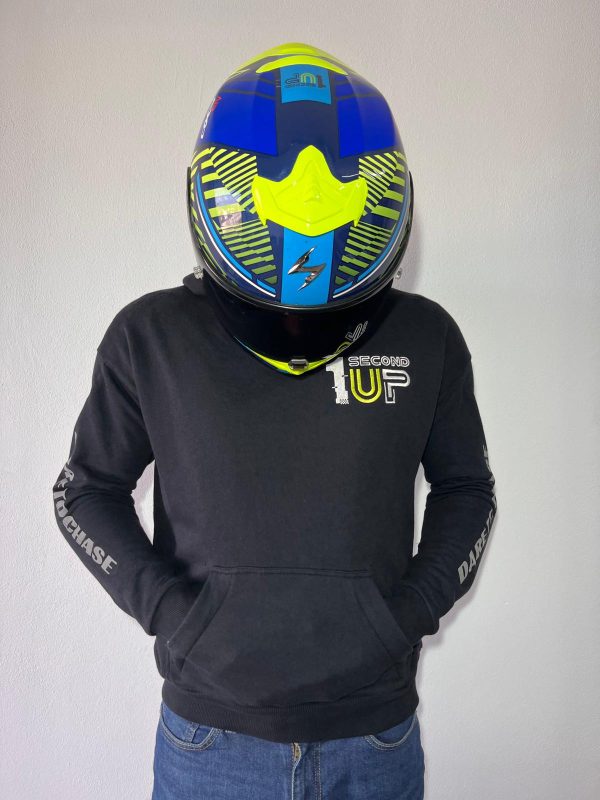 Second 1UP black motorcycle hoodie with 'Dare to Chase' branding, worn by a person in a helmet, designed for motorsports enthusiasts